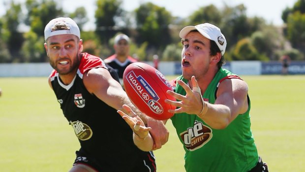 Paddy McCartin and Sam Fisher show their style during a St Kilda training session.