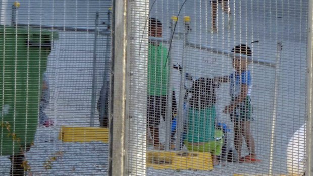 Children playing near the Refugee Processing Centre on Nauru.