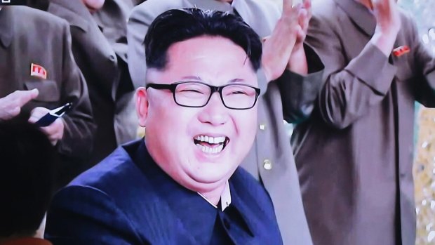A South Korean TV news channel shows an image of North Korean leader Kim Jong-un.
