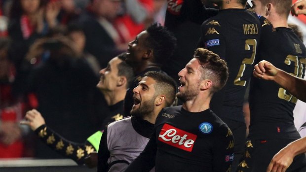 Napoli players celebrate their victory.