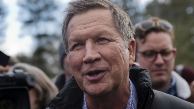 John Kasich, Ohio Governor and 2016 Republican presidential candidate, greets voters in Concord, New Hampshire.