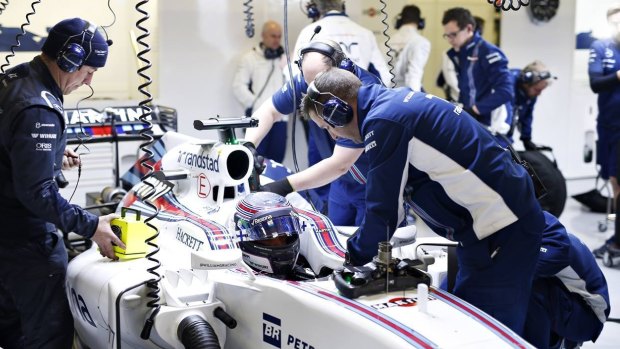 In the pits with the Williams team: tiny adjustments can make all the difference on the track.