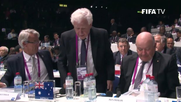 Frank Lowy, the head of the Football Federation Australia, casts his ballot in Zurich.