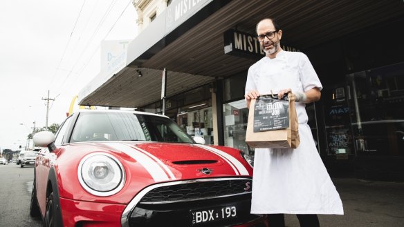 Joe Vargetto from Mister Bianco in Kew is delivering pasta in a red Mini.