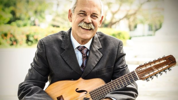 Barbarito Torres with his laud, a type of lute. Through the Buena Vista Social Club "I got to play it for the world and teach people about it."