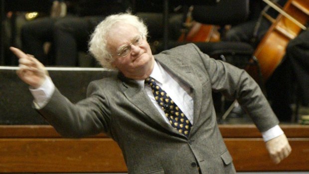 Richard Gill's colourful conducting style captivates children in an introduction to music in 2004. 