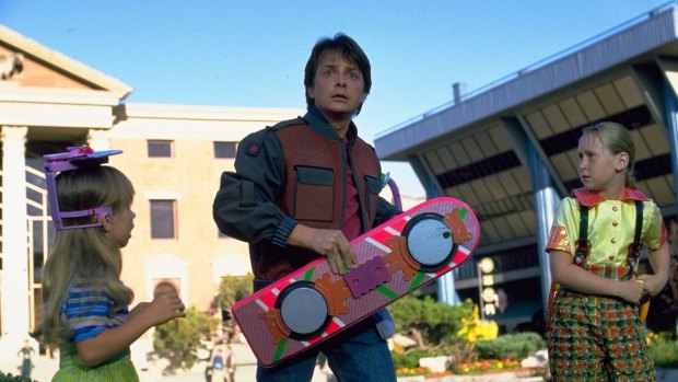 Everybody's got one of these, right?: Michael J. Fox with a hoverboard in <i>Back to the Future Part II</i>.