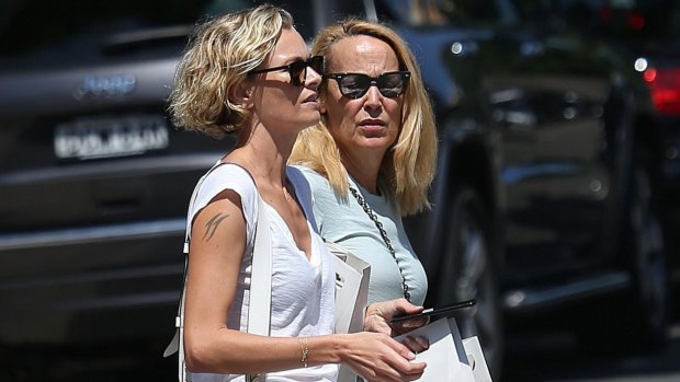 Sarah Murdoch helps stepmother-in-law Jerry Hall shop in Sydney this week.