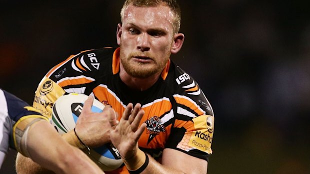 Matthew Lodge in action for Wests Tigers against the Cowboys this year.