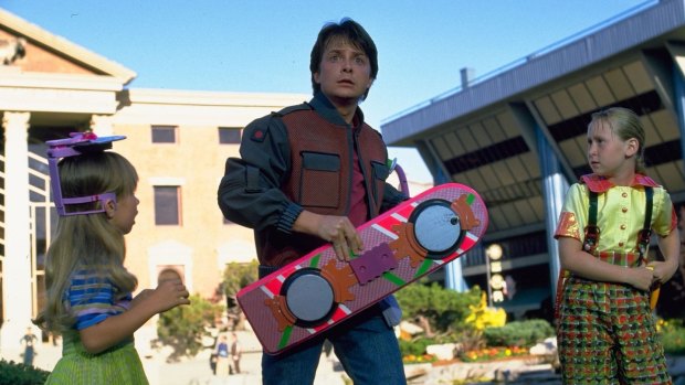 Everybody's got one of these, right?: Michael J. Fox with a hoverboard in <i>Back to the Future Part II</i>.