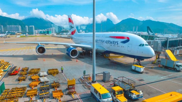 A British Airways plane dock in Hong Kong International Airport.