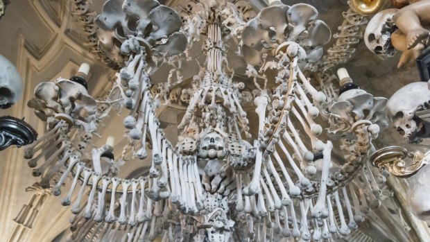 Selfie-takers have been observed rearranging bones at the church.