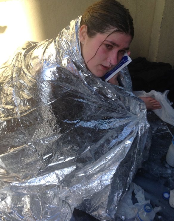 Anti-racism protester treated after being sprayed with pepper spray.