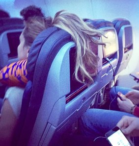 Enjoy the inflight entertainment, if you can. A photo from Passenger Shaming.