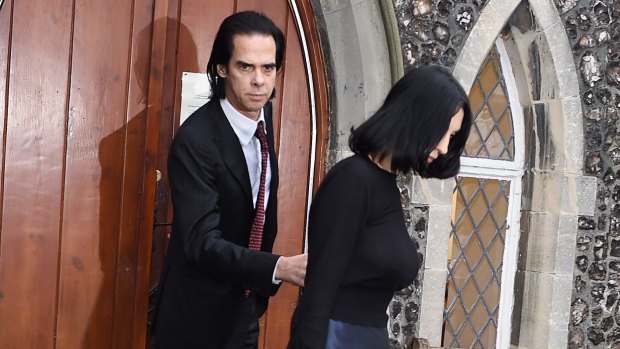 Musician Nick Cave and wife Susie Bick attend the inquest into their son's death at Brighton Coroner's Court on Tuesday.  
