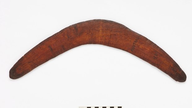 A boomerang on display in a regional British museum, one of several items identified as survivors of Australia's first cricket tour of England. 