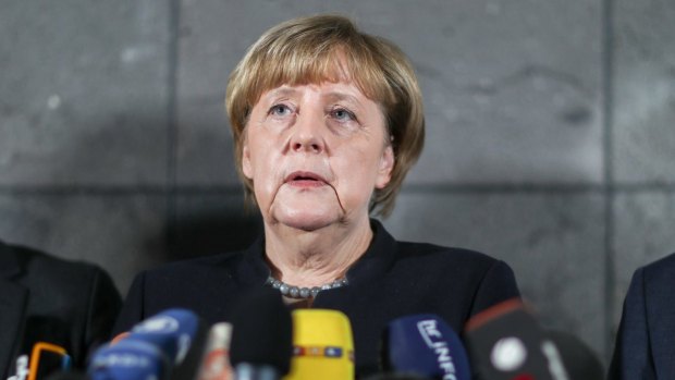 German Chancellor Angela Merkel, delivers a statement on Thursday to media.