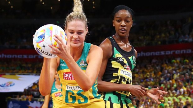 Caitlin Bassett is challenged by Kadie-Ann Dehaney of Jamaica during the 2015 Netball World Cup Semi Final 2 match.