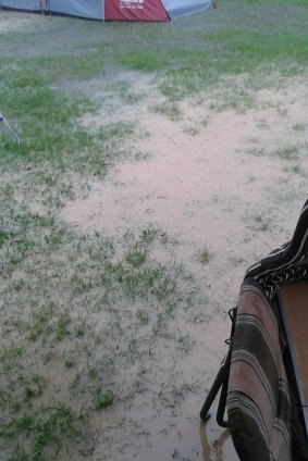 White out: Kay Sawyer posted a photo of hail at Kenilworth Showgrounds on Saturday afternoon.