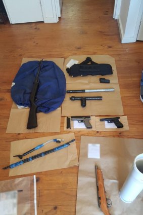 Police have seized 14 firearms from the Kambah home of Jack Bernard Peter.