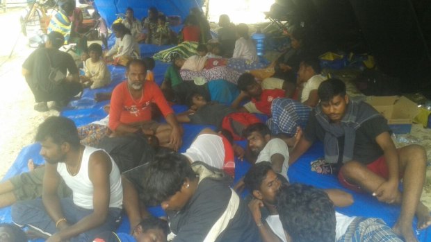 Sri Lankans were sheltered in a tent on the beach in Aceh over the weekend, while their boat was repaired.