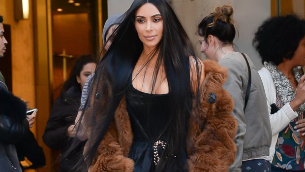 Kim Kardashian has been spotted out recently teaming her trackie dacks with fur.