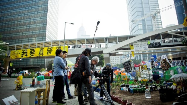 Christopher Doyle, Australian cinematographer and filmmaker, filming in Hong Kong.