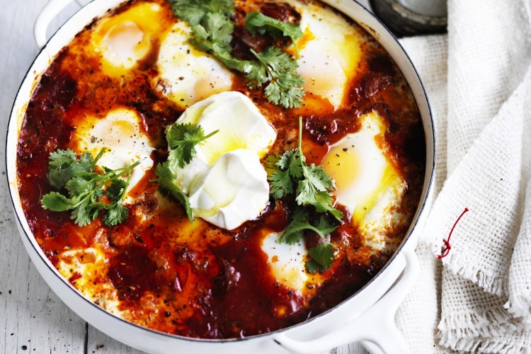 Neil Perry recipe: Baked Eggs with spicy sausage and labna.