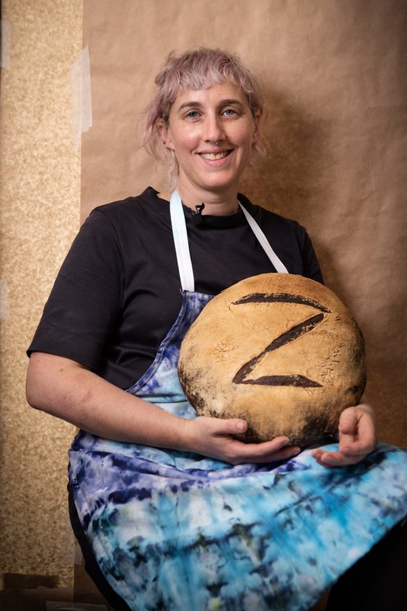 Maaryasha Werdiger with a kosher miche loaf at her new Zelda Bakery. 