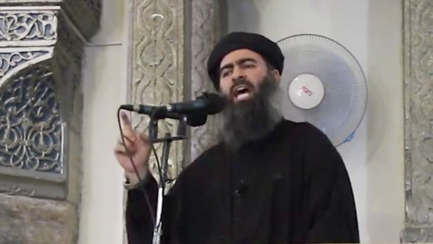 Islamic State leader and "caliph" Abu Bakr al-Baghdadi addresses inhabitants of Mosul in 2014, shortly after the group's conquest of the city.
