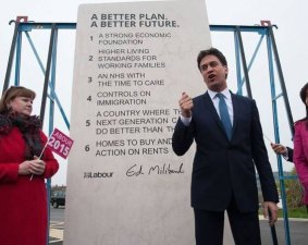 Ed Milliand in front of his tablet of promises.