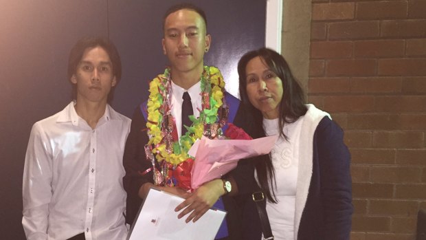 Danukul Mokmool, on the left, with his half-brother Charlie Huynh and their mother, had attended church after his release from prison.