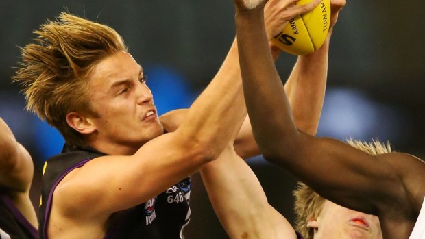 Harry Morrison marks during the 2016 TAC Cup grand final.