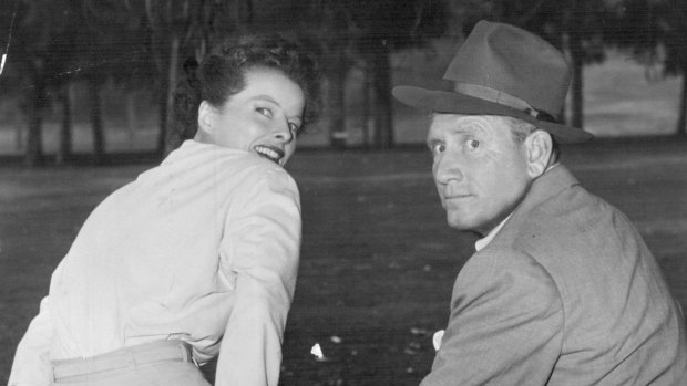Spencer Tracy and Katharine Hepburn between takes for the comedy Pat and Mike. 