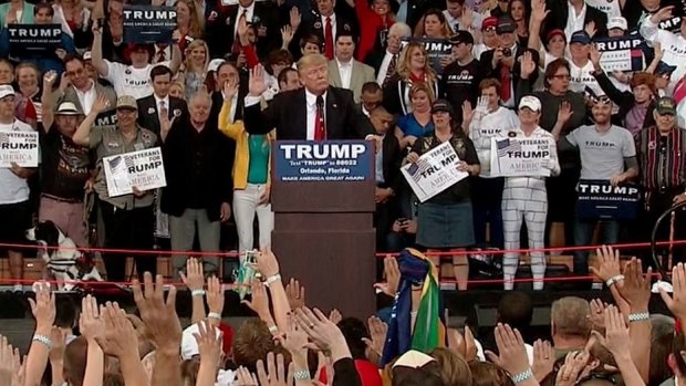 Donald Trump asks supporters to pledge their allegiance to him during a rally in Florida.