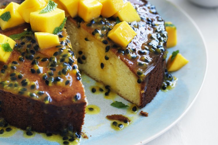 Neil Perry's passionfruit syrup cake with mango salsa.