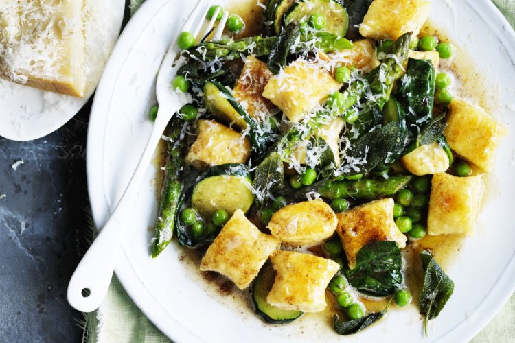 Ricotta gnocchi with spring vegetables and burnt butter.