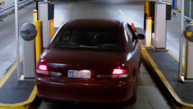 Three men leave the Canberra Centre after attempting to break into a pay station.