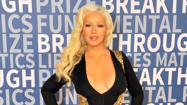 The Voice judge Christina Aguilera performed a duet with a hologram of Whitney Houston, but the song was replaced due to quality concerns from Houston's family.