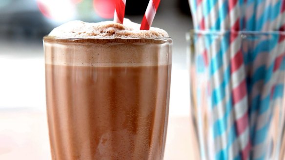 A double chocolate and peanut butter shake made from white milk