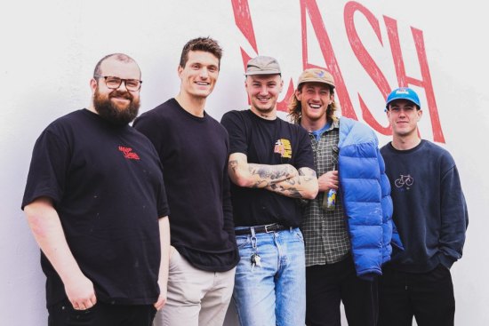 Chef Bill Steele and business partners Brody Mihocek, barista Jordan Faulkner, Nathan Murphy and Callum Brown outside their new Whiplash cafe.