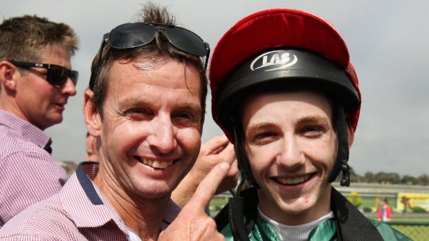 Proud dad: Peter Mertens and his son Beau."Just three years ago he was jumping over logs on little ponies at the back of the farm," says Mertens snr.