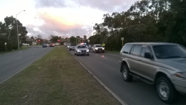 The scene on Stirling Highway after a sheep was thrown from a truck.