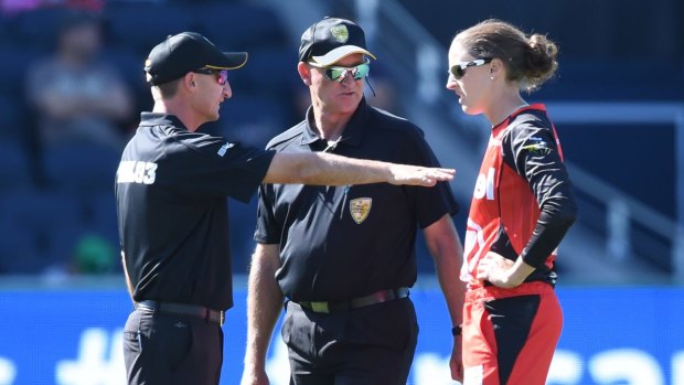 Confusion: Renegades player Amy Satterthwaite talks to umpires after the match had to go to a super over.