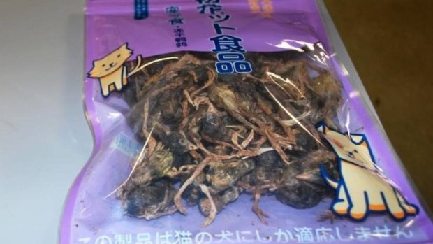 The package of tiny dead birds found in a passenger's luggage.