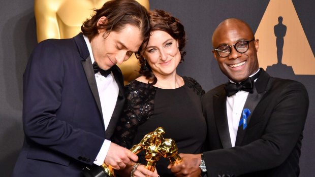 Producers Jeremy Kleiner and Adele Romanski and director Barry Jenkins with their best picture Oscars.