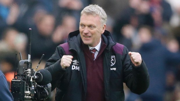 West Ham United manager David Moyes celebrates after the win.