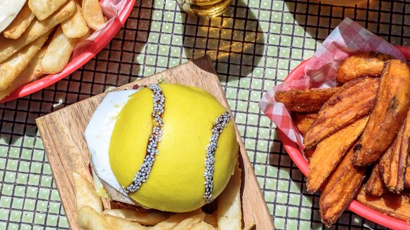 The Baseline Burger's yellow buns are coloured by saffron and matcha. 