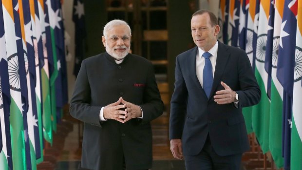 India's Prime Minster Narendra Modi, left, and Australian Prime Minister Tony Abbott.