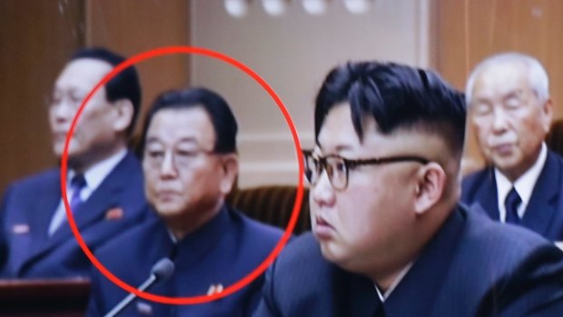 Kim Yong Jin, second from left, a vice premier on education affairs in North Korea's cabinet, and North Korean leader Kim Jong-un, second from right.